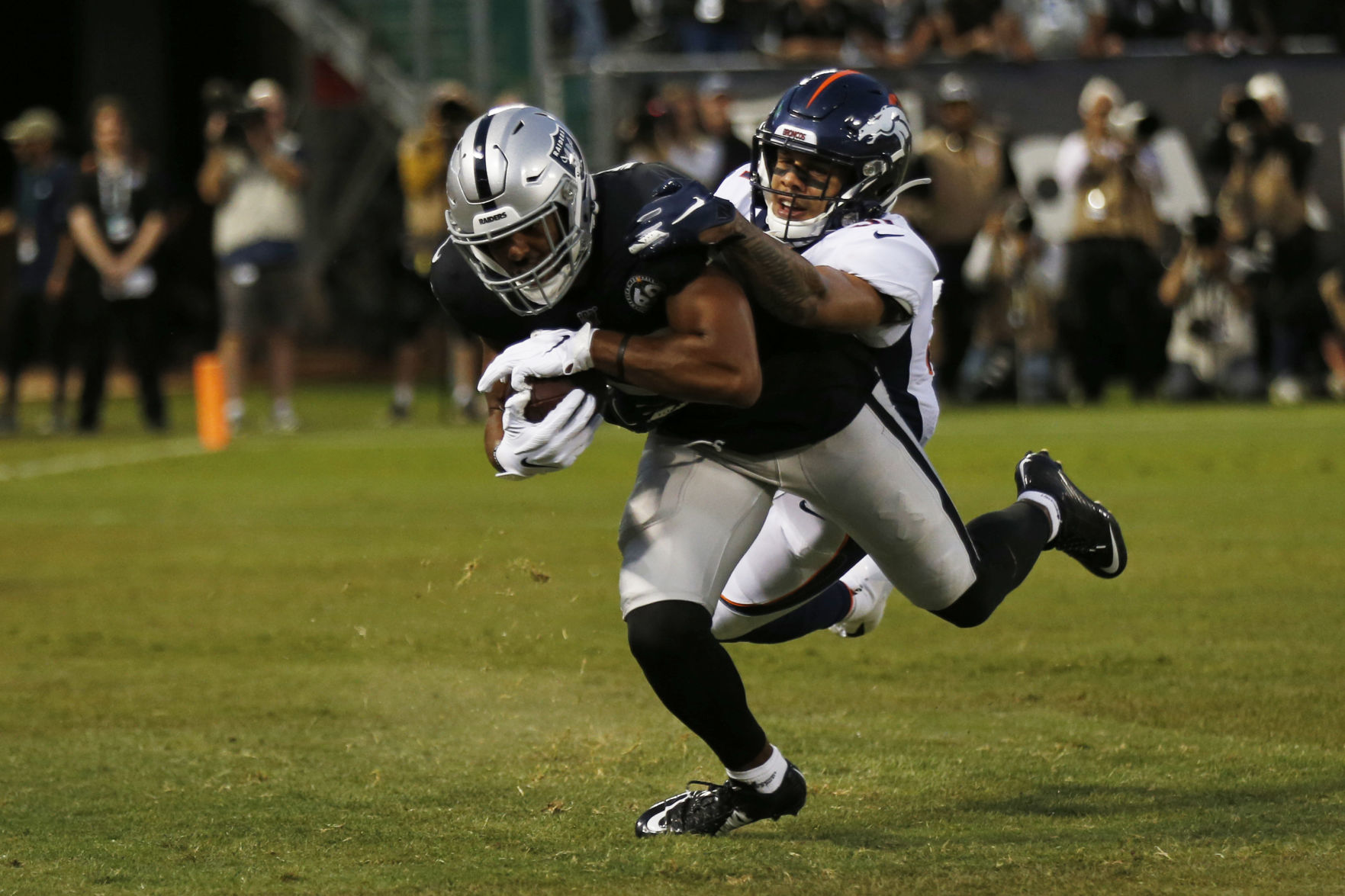 Broncos Raiders Football